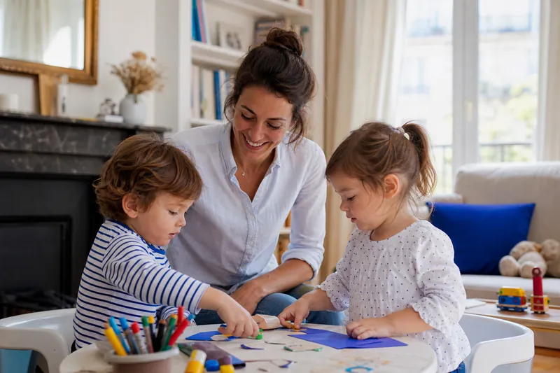 Childcare provider meeting a family at home